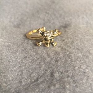 Gold and rhinestone skull ring
